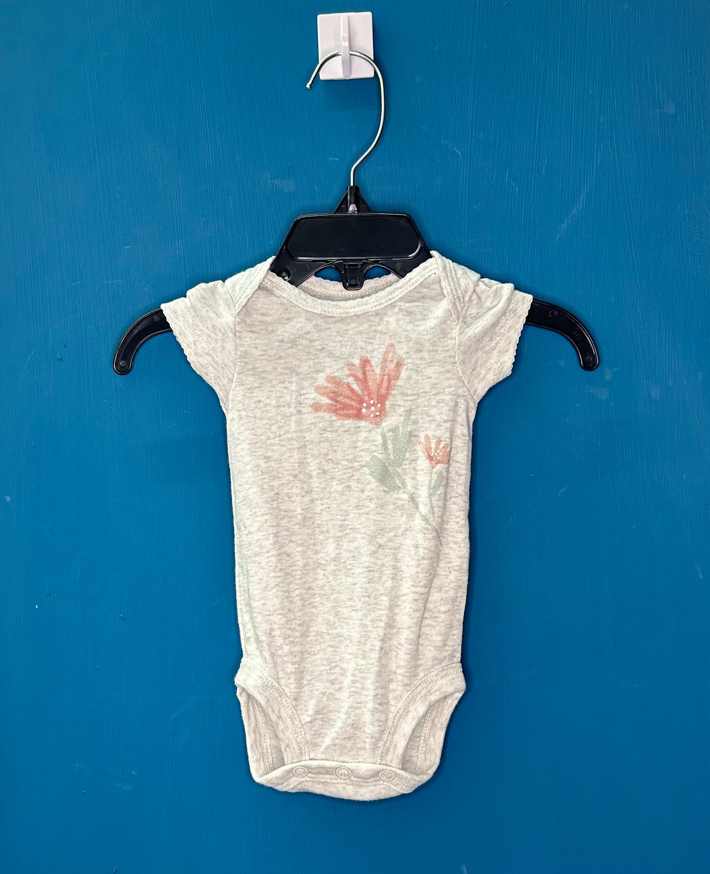 EUC Carter’s NB Grey Flower SS Onesie