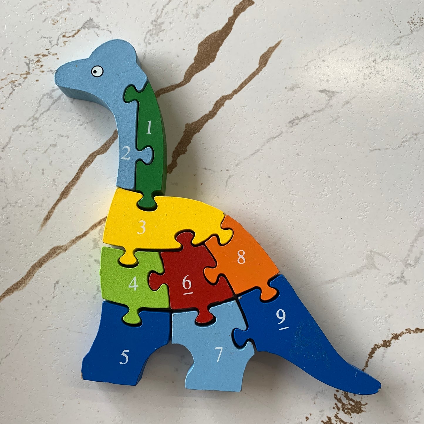 EUC 9 Piece Wood Dinosaur Puzzle
